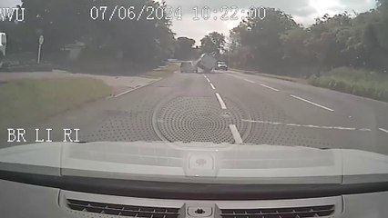 Thug drives van on two wheels during police chase