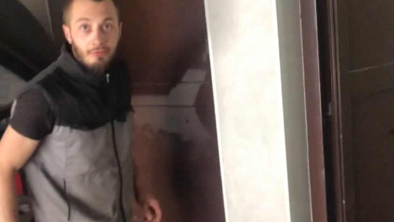 Man struggles with fear while trying to save a trapped pigeon