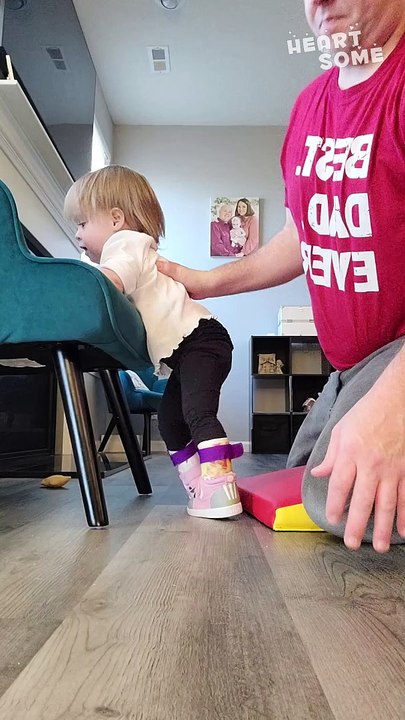 Dad's Unwavering Support! Daughter Takes Inspiring Steps