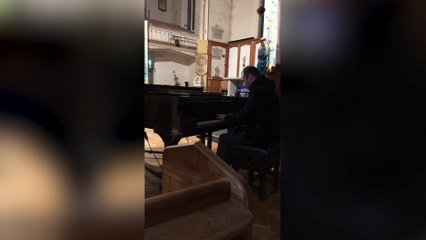 Rhys Wynne-Jones playing the piano