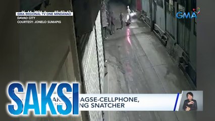 Lalaking nagse-cellphone, nabiktima ng snatcher | Saksi
