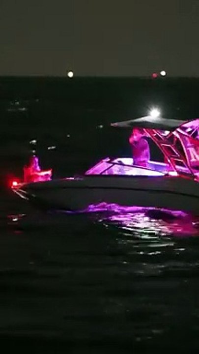 My friend Robert on a wavy night at the Haulover Inlet in Bal Harbour, Florida