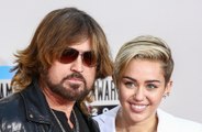 Miley Cyrus is reportedly 'hopeful' that her father's divorce will mend their family rift