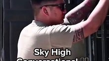 Sky High Conversations! ✈️- Two Camouflaged Men Chatting Underneath an Airplane!