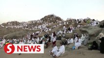 Muslim pilgrims converge at Mount Arafat for daylong worship as Hajj reaches its peak