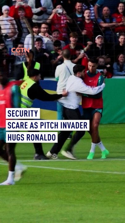 Security scare as pitch invader hugs Ronaldo