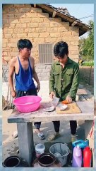 Elder brother helping younger brother