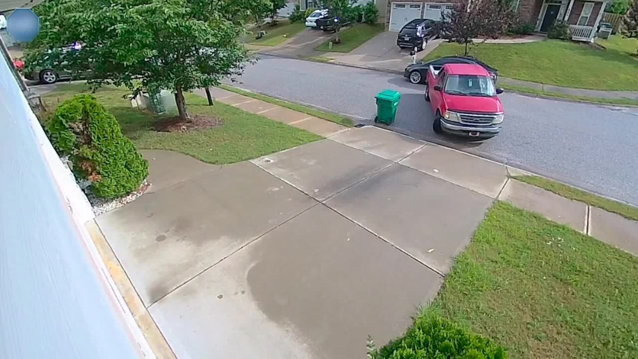 Delivery Truck Hits Parked Car While Reversing Out of Driveway