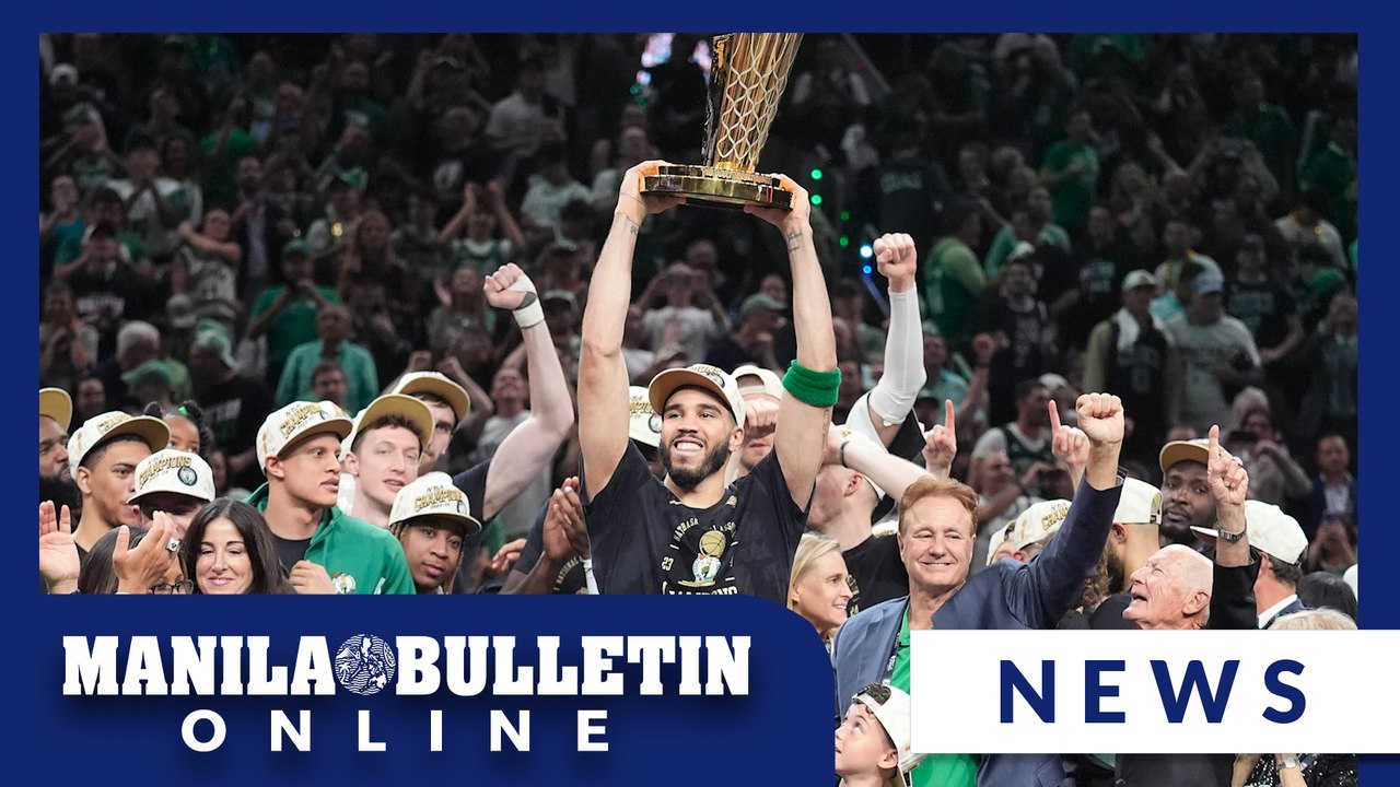Fans flood the streets of Boston to celebrate the Celtics winning their 18th NBA Championship