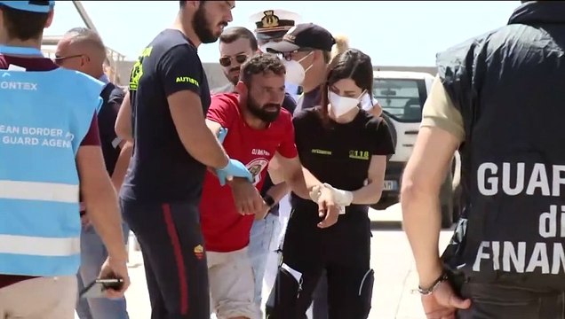 At least 11 dead and 64 missing after 2 ships sink off the coast of Italy