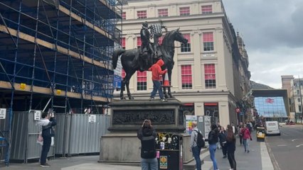 The Iconic Cone Tradition: Glasgow's people celebrate humor & bravery on Duke of Wellington statue