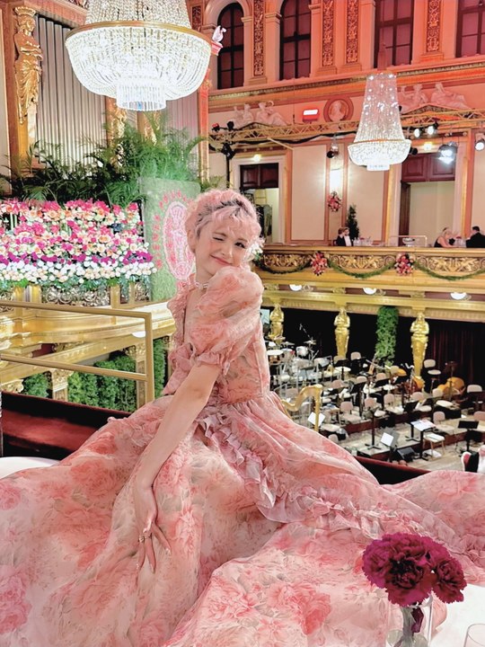 Meet the woman obsessed with the colour PINK - who wears shades of it every day, has pink hair and lives in a pink flat