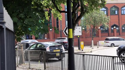 Worst parking ever: Cars dumped on roundabout outside mosque
