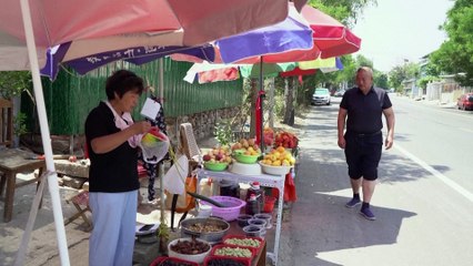 Chinese farmers struggle in the heat as reservoir shrinks