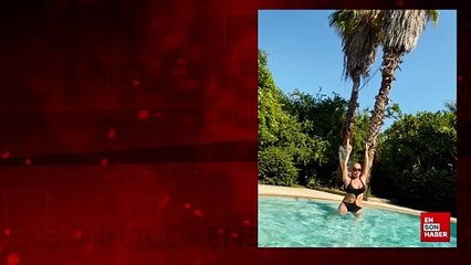 Yonca Evcimik havuzun içinde poz verdi