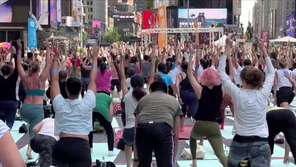 These Yogis Didn’t Let Heat Stop Their ‘Solstice in Times Square’ Tradition