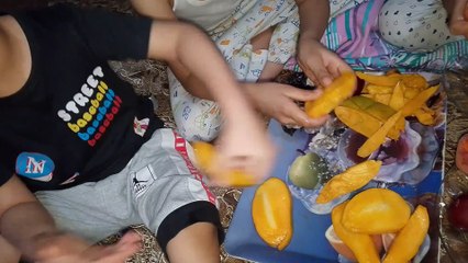 Eating Mangos | zarqa ali
