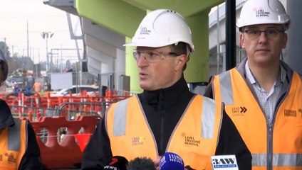 Residents confront minister as new Keon Park station bring trains metres from apartments