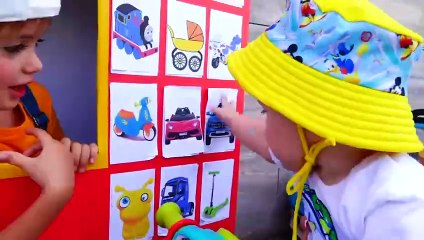 Niki rides a rickshaw and plays a game selling toy cars to children