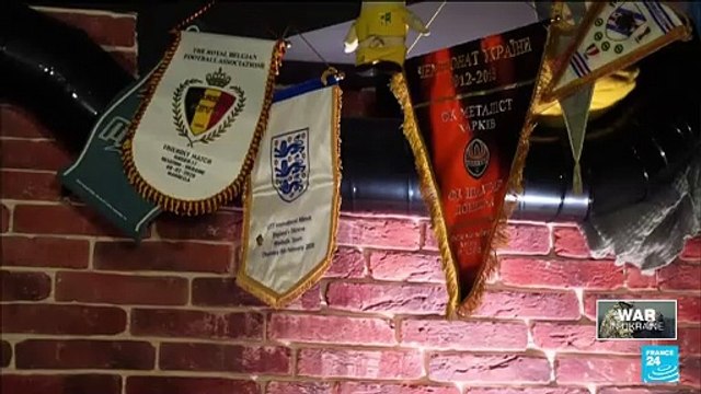 'On mornings when there aren’t air raid sirens, kids play football outside the Kharkiv Metalist stadium'