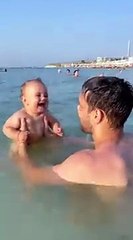 Beachgoing Baby Belly Laughing __ ViralHog