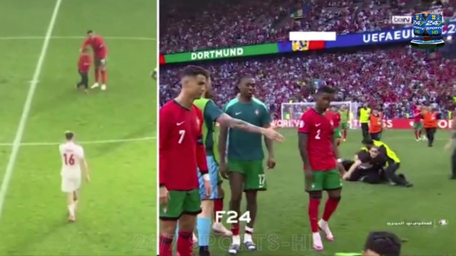 Goncalo Ramos is clattered by a STEWARD after security tried to stop a SIXTH pitch invader from getting a selfie with Cristiano Ronaldo in chaotic scenes following Portugal's win over Turkey