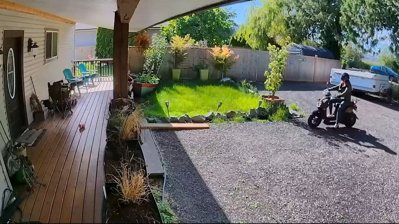 Woman Parking Moped Accidentally Crashes It Into Front Door