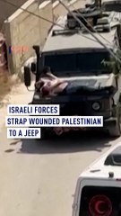 Israeli forces strap wounded Palestinian to a jeep