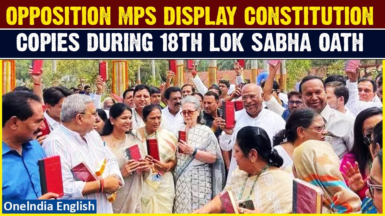 Opposition MPs Protest in Parliament Holding Copies of the Constitution in Symbolic Gesture