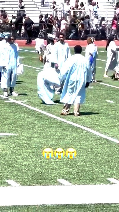 Guy Fails at Backflip During Graduation Ceremony