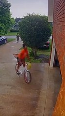 Girl Riding Bicycle Presses Break Hard and Accidentally Falls Inside Garage?