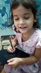 Trishu creating doll drawing -june24