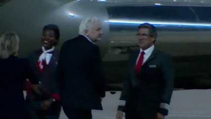 Julian Assange reunited with wife Stella as he touches down in Australia as a free man
