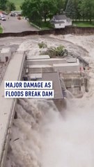 Major damage as floods break dam