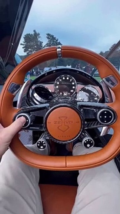 Swiveling screens on a million dollar car? The Zenvo Aurora has no infotainment screen but has two dials that spin, one if you signal a lane change to show a screen with a blind-spot camera image and the other an i