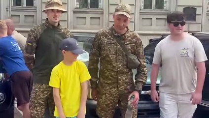 Stogursey youngster William Wilson, aged 10, in Ukraine delivering aid for frontline troops.