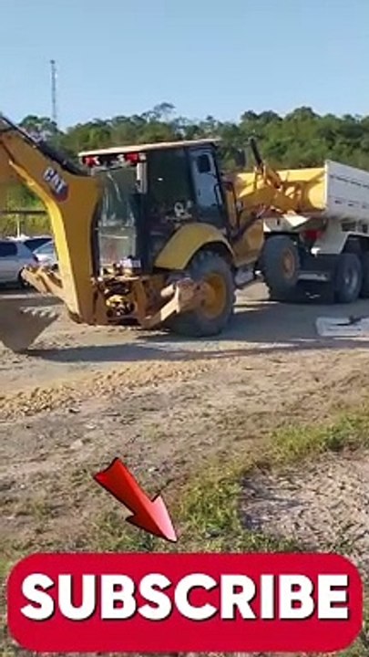 JCB loading on truck without ramps