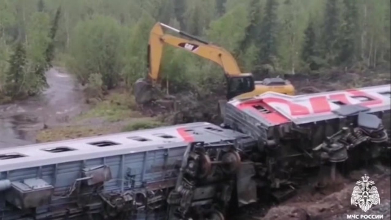 Rescuers pull injured passengers from train after derailment in northern Russia