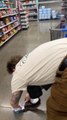 Guy Falls While Trying to Ride Shopping Cart