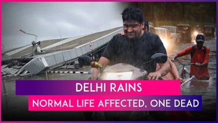 Скачать видео: Delhi: Heavy Rains Affect Normal Life, 1 Killed After Portion Of Roof Collapses At IGI Airport’s T 1