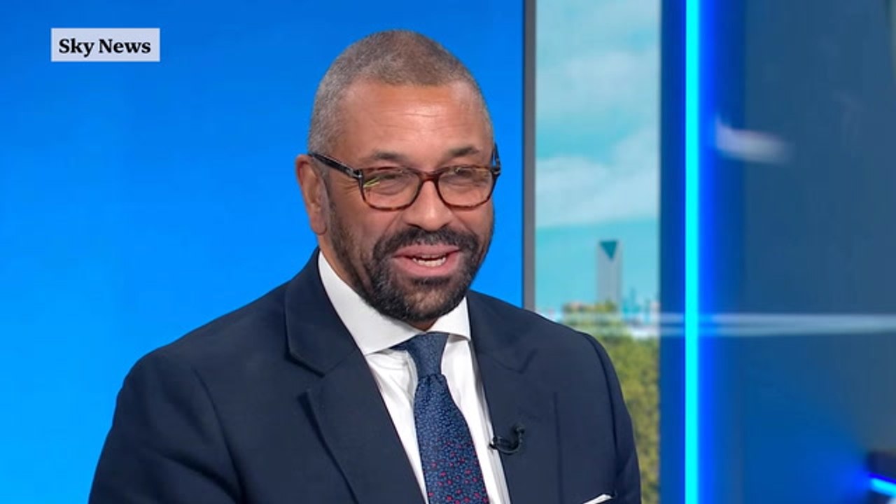 James Cleverly jumps on a Lime bike to get to TV interview