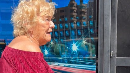 Prankster defuses tension with a giant inflatable phone, leaving everyone smiling