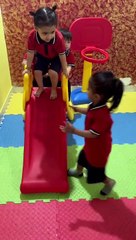 Adorable Kids Having Unlimited Fun on Slides and Toys