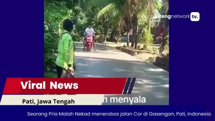 jatengnetworktv - Viral Seorang Pria Menerobos Cor dengan Motor