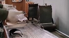 Workers are testing 500mm 1200w halogen heat lamps