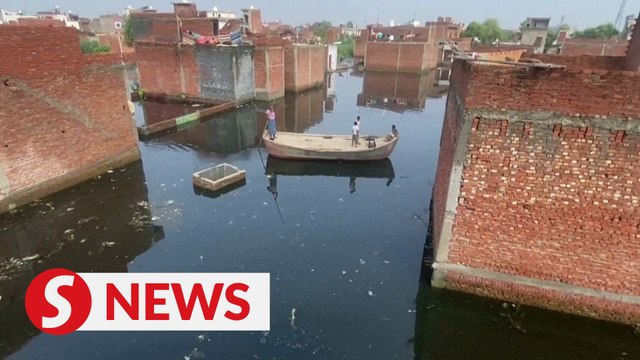 India residents turn to boats as severe flooding inundates cities