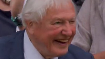 Moment Wimbledon Centre Court crowd rises to clap and cheer arrival of David Attenborough