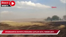 Diyarbakır'da kuvvetli rüzgarda çatı ve pazar şemsiyeleri uçtu, bir mahallede yangın çıktı