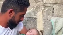 A Palestinian father cries after seeing his daughter die