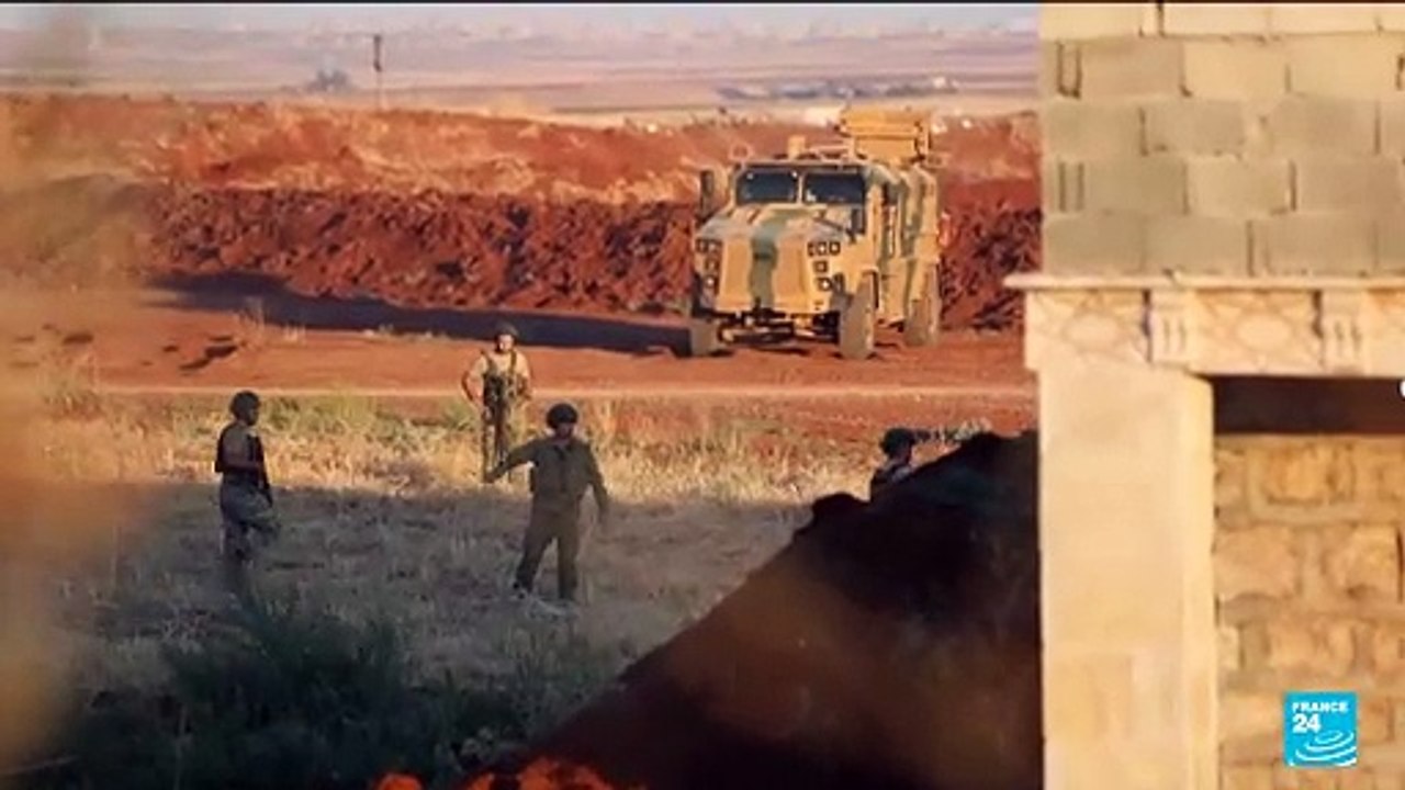 Armed protesters, Turkish forces clash in north Syria